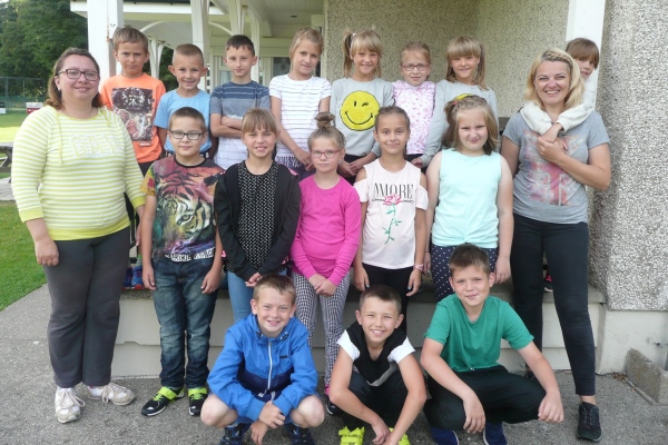 Interpreters Olyia Sapunova (left) and Irina Zuzina (right) with some of the visiting children from Belarus in 2018